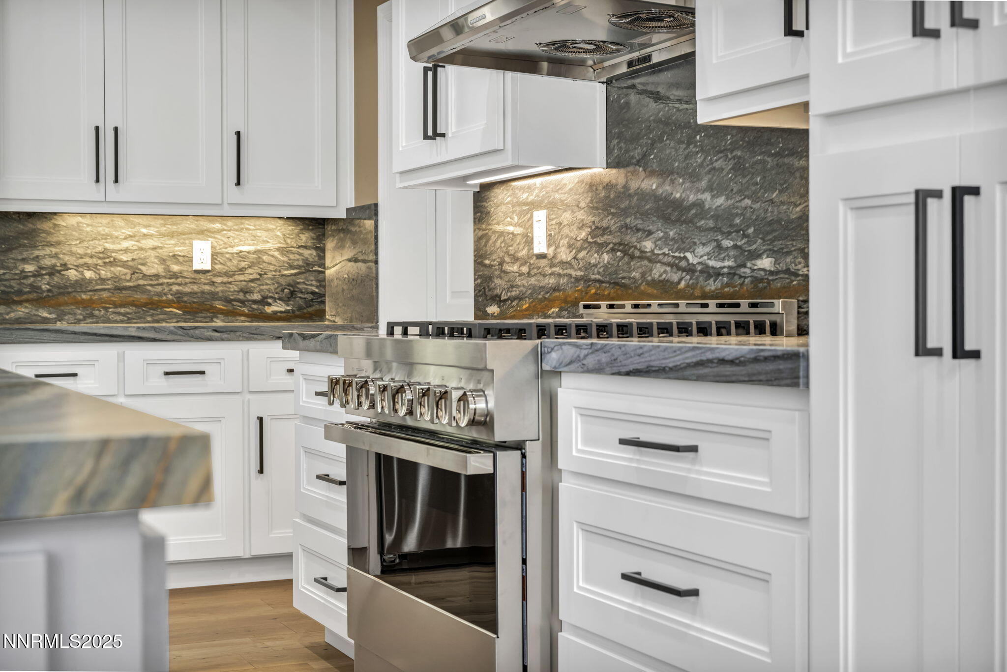 2965 Roundrock Court Reno, NV 89511 - Photo 45 of 119 a kitchen with stainless steel appliances granite countertop a stove and a refrigerator