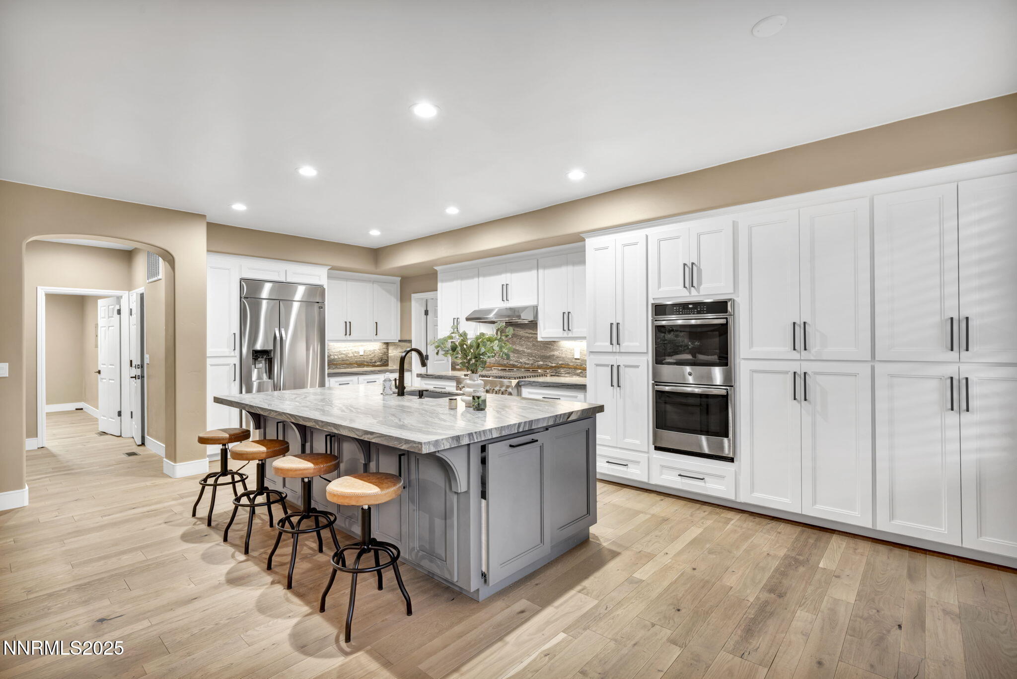 2965 Roundrock Court Reno, NV 89511 - Photo 5 of 119 a kitchen with kitchen island wooden cabinets and stainless steel appliances