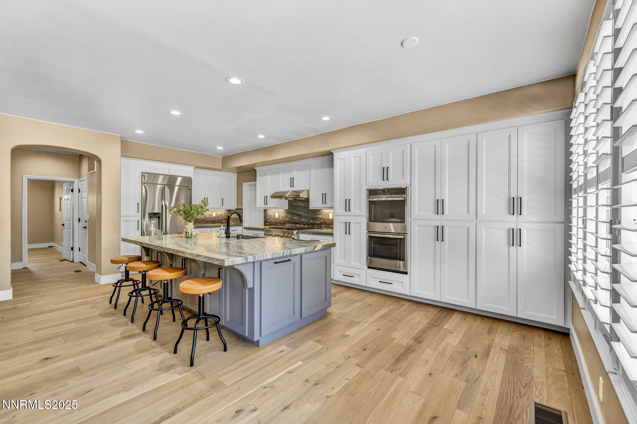 2965 Roundrock Court Reno, NV 89511 - Photo 79 of 119 a kitchen with stainless steel appliances granite countertop a refrigerator and a stove top oven