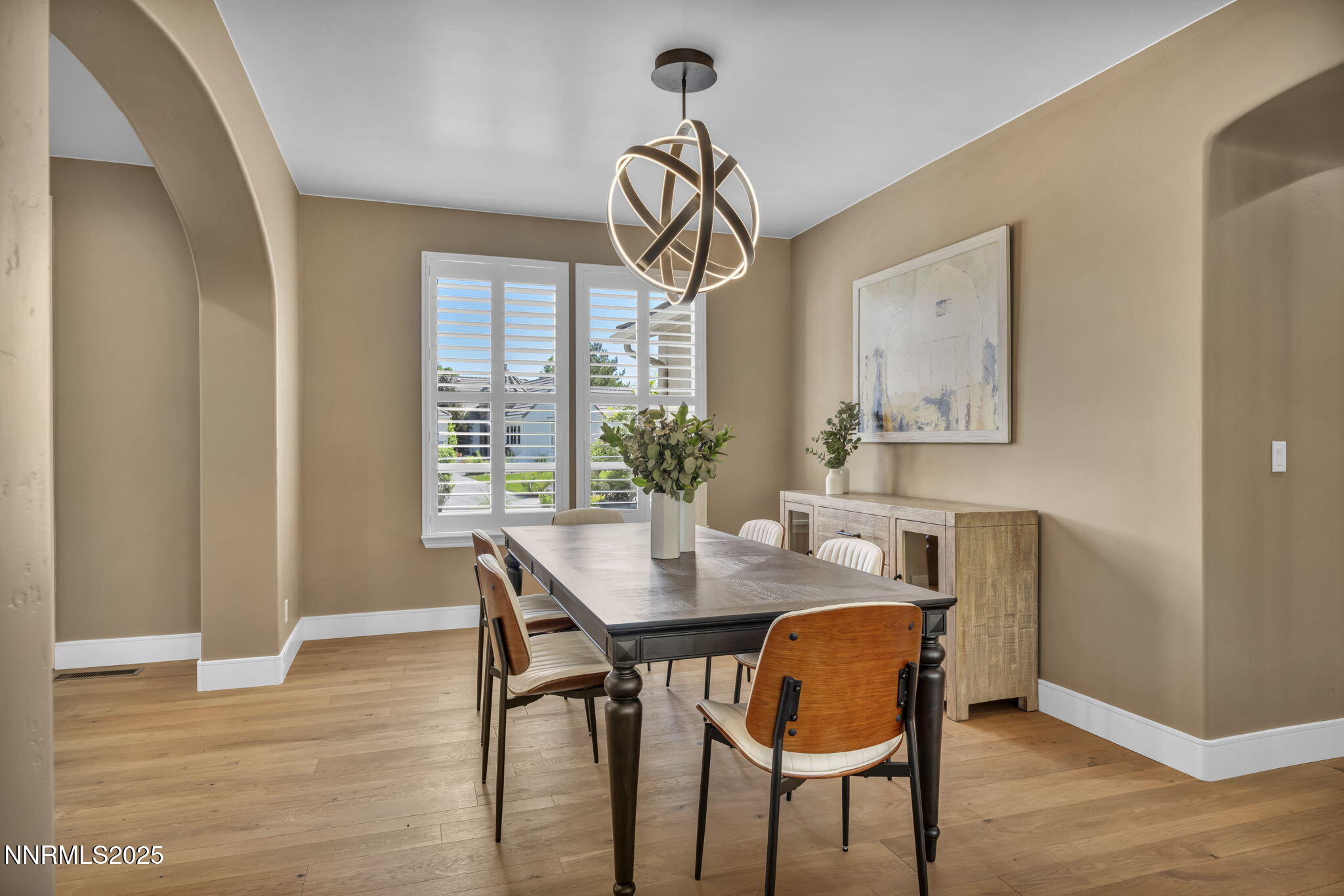 2965 Roundrock Court Reno, NV 89511 - Photo 87 of 119 a view of a dining room with furniture window and wooden floor