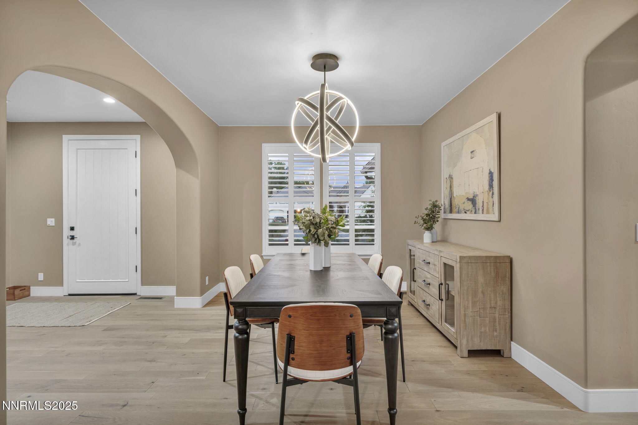 2965 Roundrock Court Reno, NV 89511 - Photo 9 of 119 a view of a dining room with furniture window and wooden floor