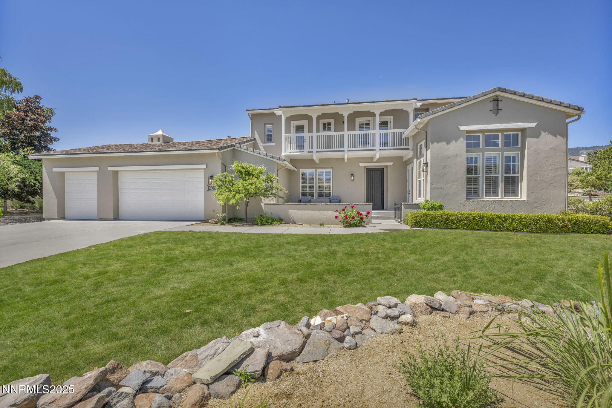 2965 Roundrock Court Reno, NV 89511 - Photo 95 of 119 a front view of a house with a garden
