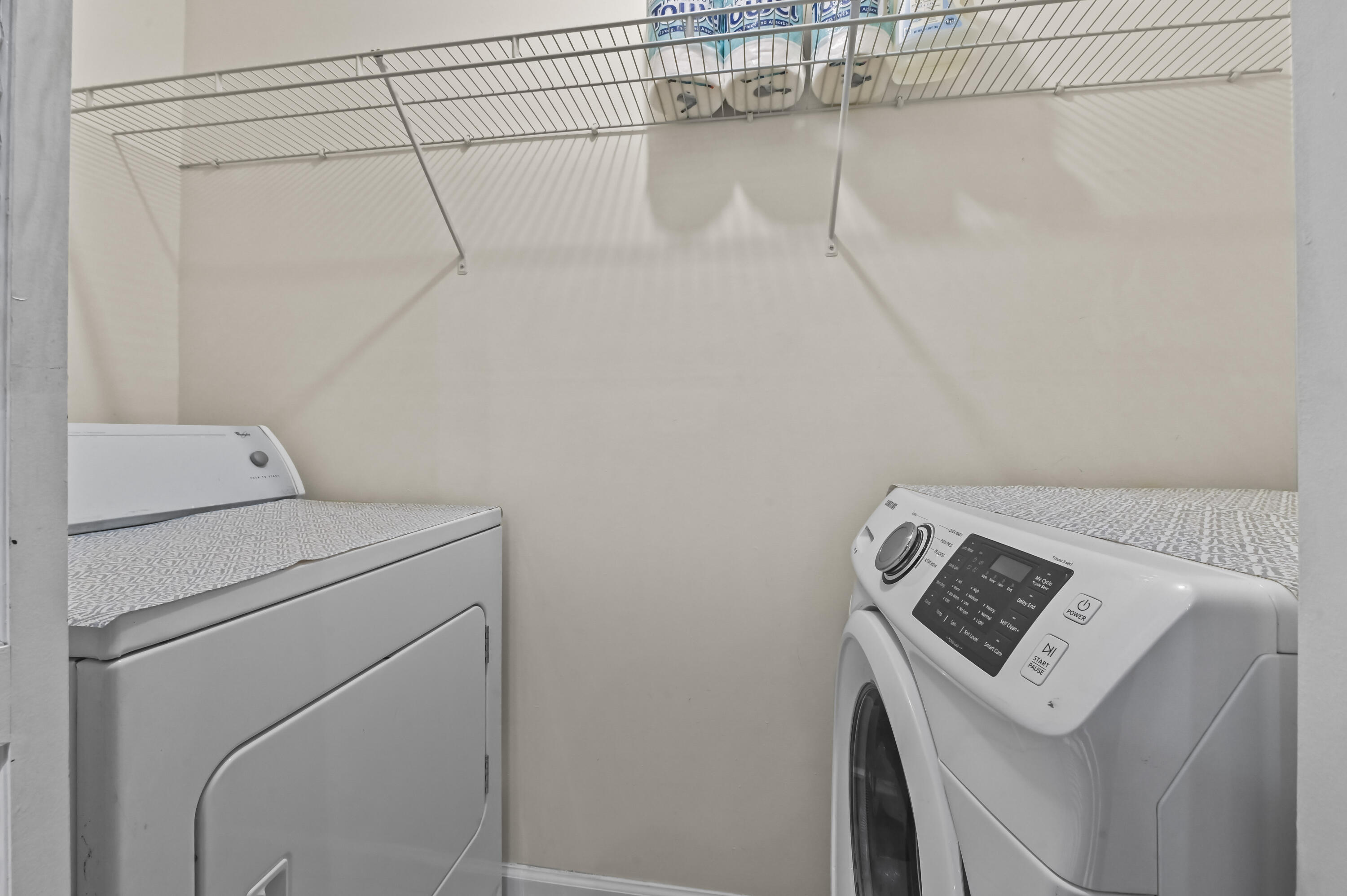 1205 Crystal Way, Unit K Delray Beach, FL 33444 - Photo 11 of 25 a utility room with dryer and washer