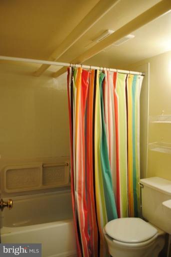 1403 Foxhall Road Northwest Washington, DC 20007 - Photo 21 of 22 a bathroom with a toilet and a shower
