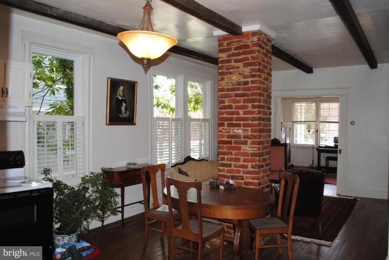 1403 Foxhall Road Northwest Washington, DC 20007 - Photo 8 of 22 a view of a dining room with furniture and chandelier