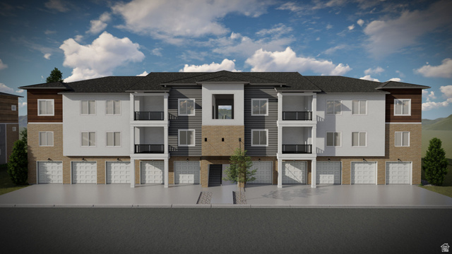 4668 Olive Avenue, Unit T202 Mapleton, UT 84664 - Photo 3 of 4 View of building exterior with a residential view and a garage