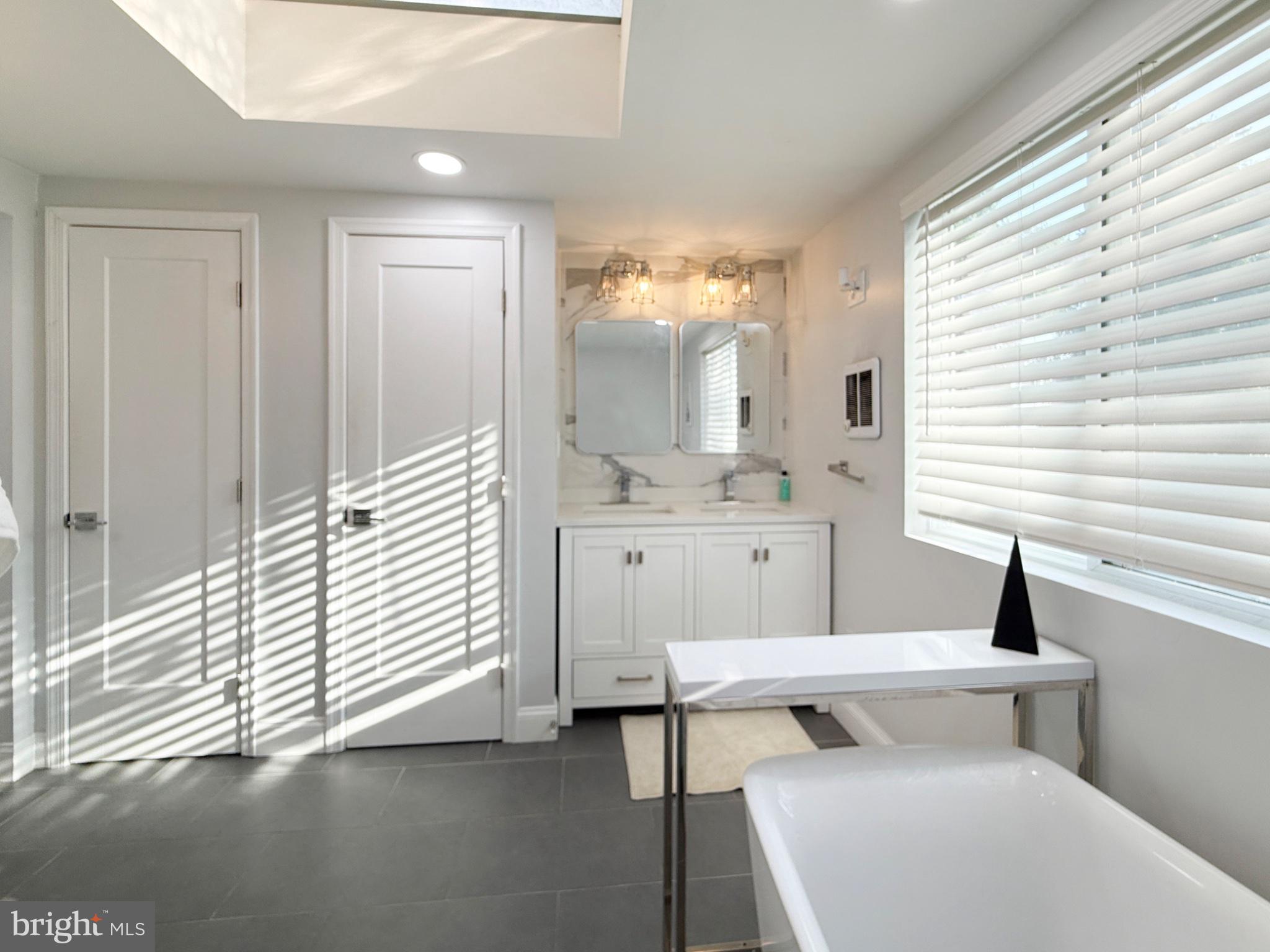 3216 18th Street Northeast Washington, DC 20018 - Photo 23 of 47 Bright and airy modern bathroom retreat.