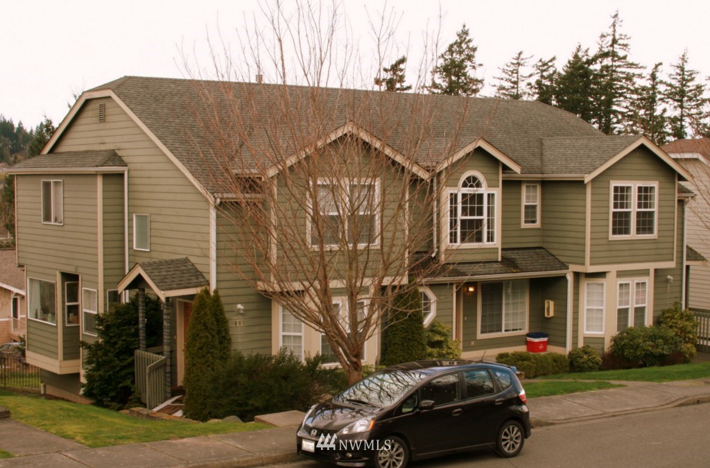 a car parked in front of a house