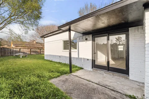 a view of a porch with a backyard