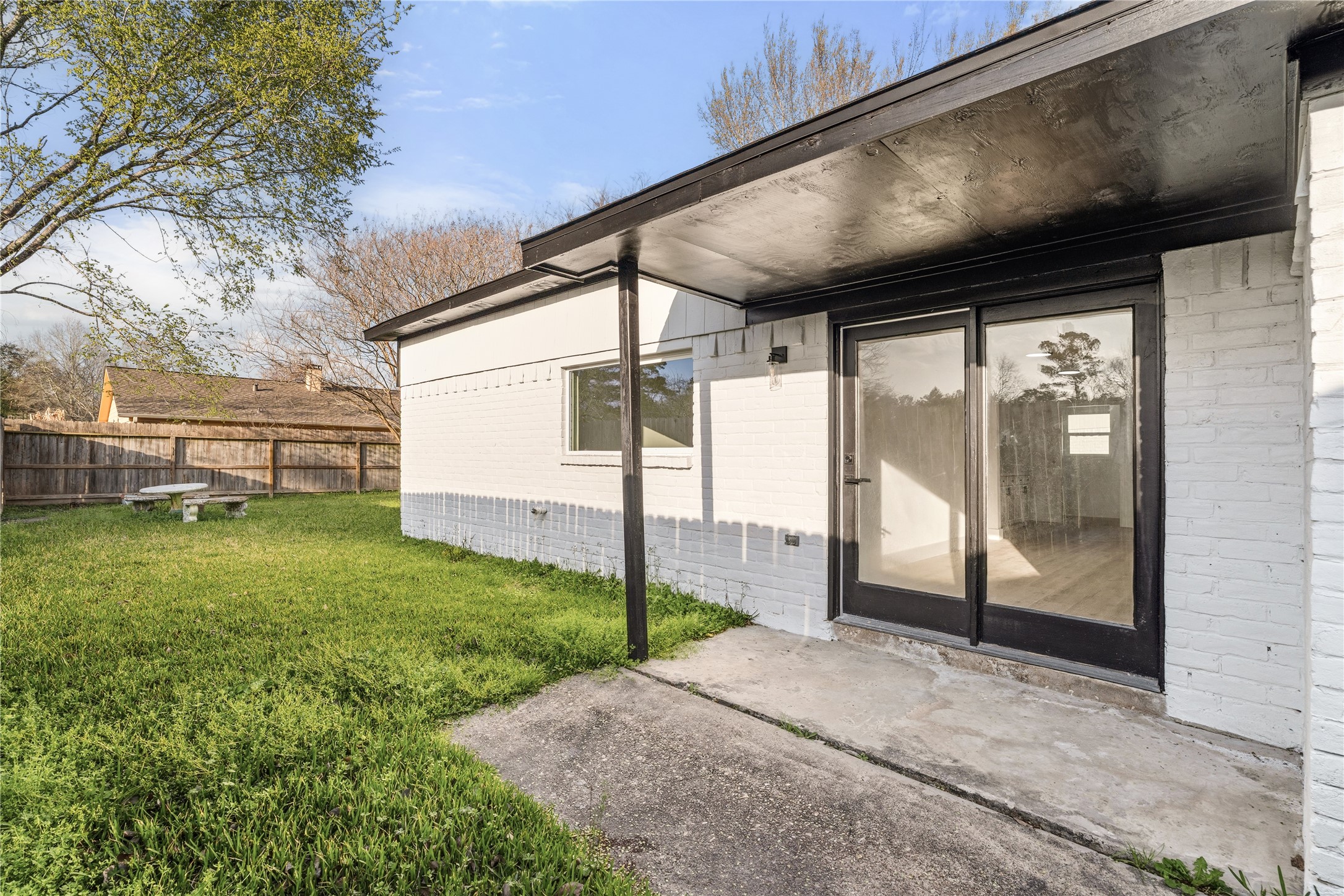 9809 Wren Court Conroe, TX 77385 - Photo 20 of 22 a view of a porch with a backyard