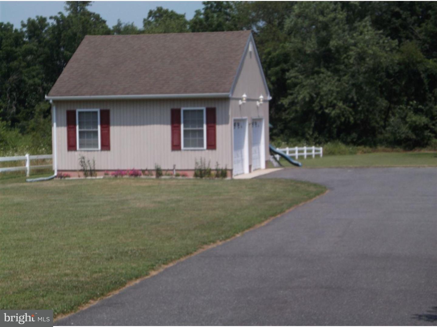 63 Beebe Run Road Bridgeton, NJ 08302 - Photo 20 of 20 a front view of a house with a garden