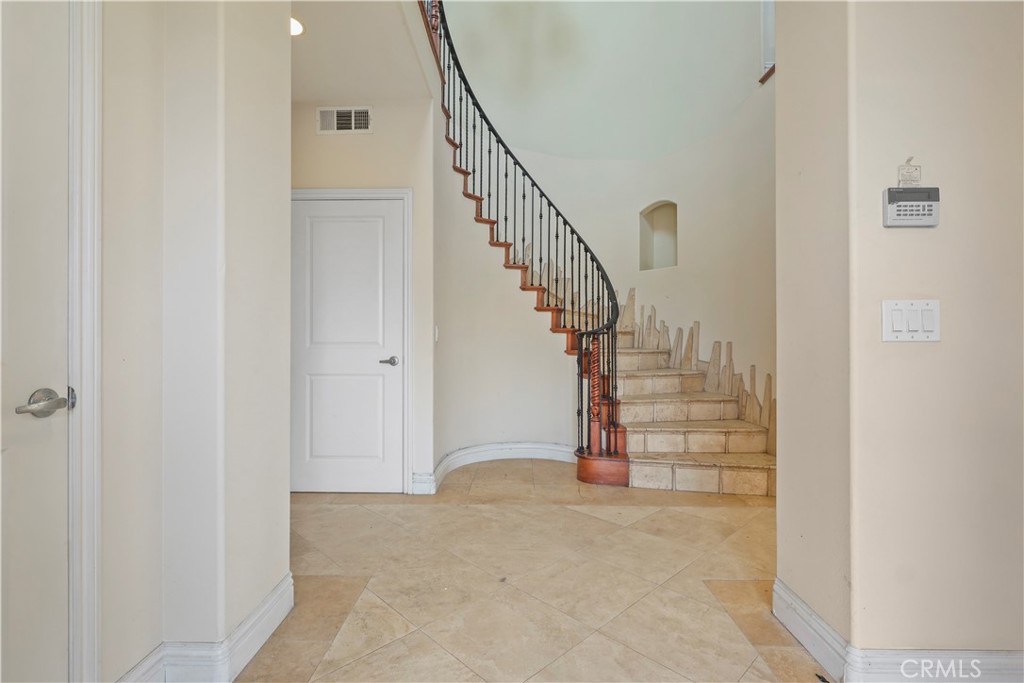17100 Apple Street Bellflower, CA 90706 - Photo 14 of 38 a view of entryway with wooden floor