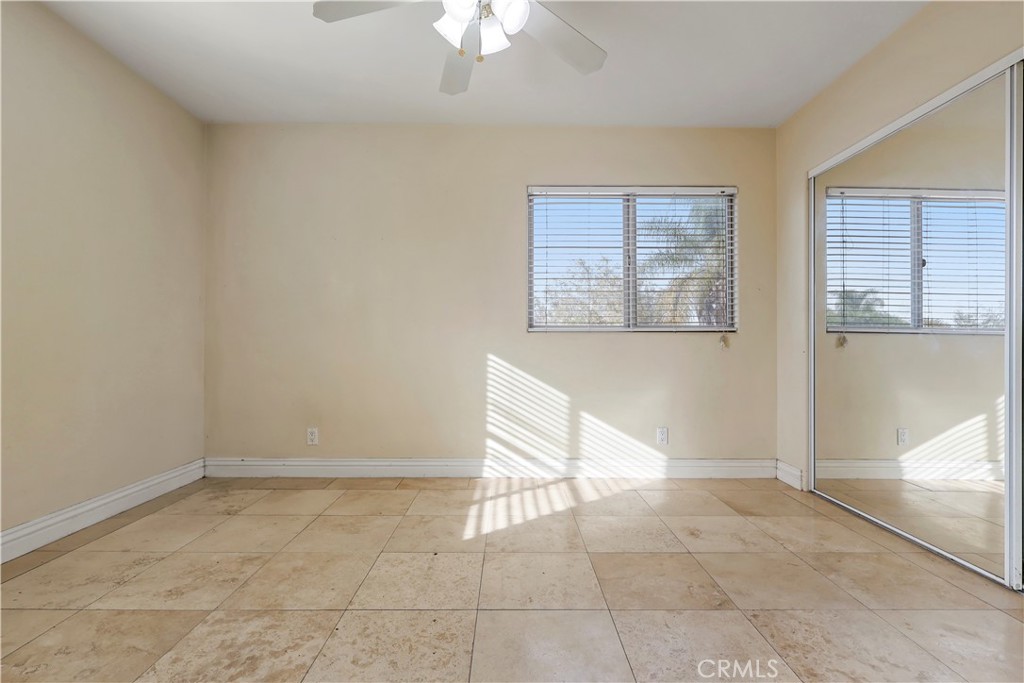 17100 Apple Street Bellflower, CA 90706 - Photo 19 of 38 a view of an empty room with a window