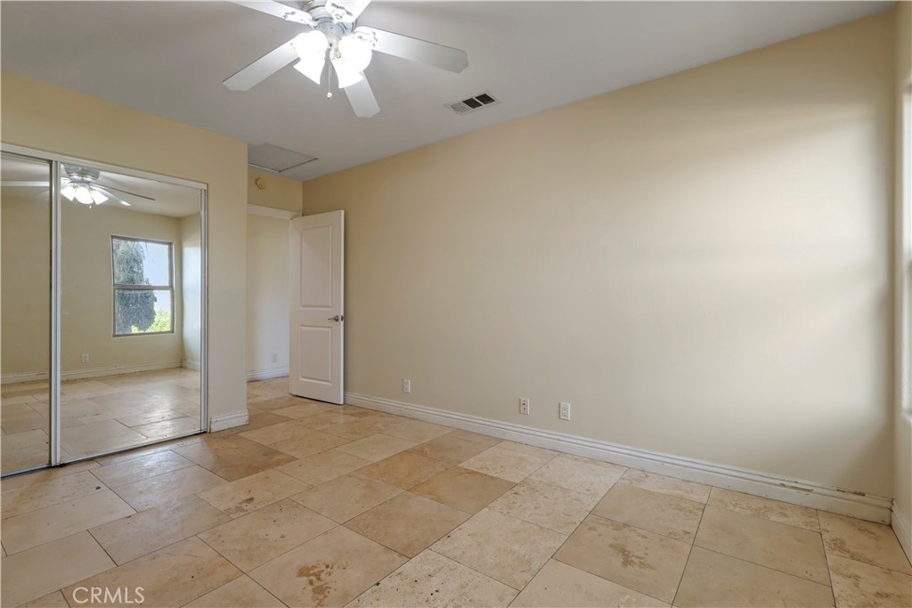 17100 Apple Street Bellflower, CA 90706 - Photo 21 of 38 an empty room with a bathroom