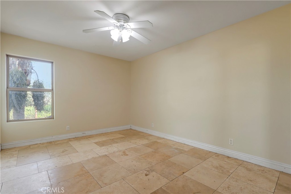 17100 Apple Street Bellflower, CA 90706 - Photo 25 of 38 an empty room with a window