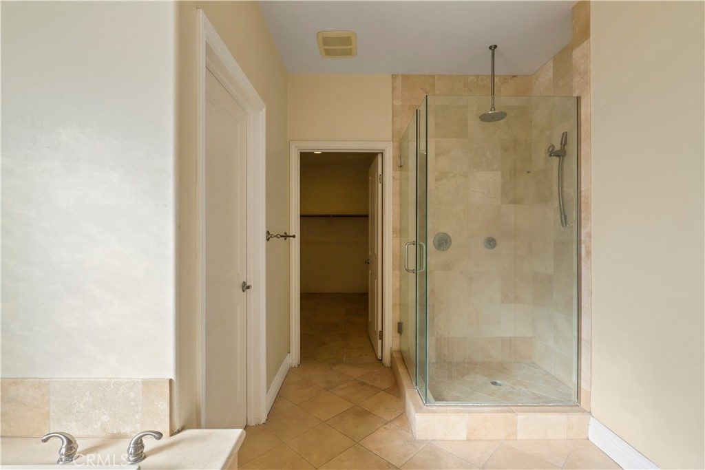 17100 Apple Street Bellflower, CA 90706 - Photo 29 of 38 a bathroom with a shower