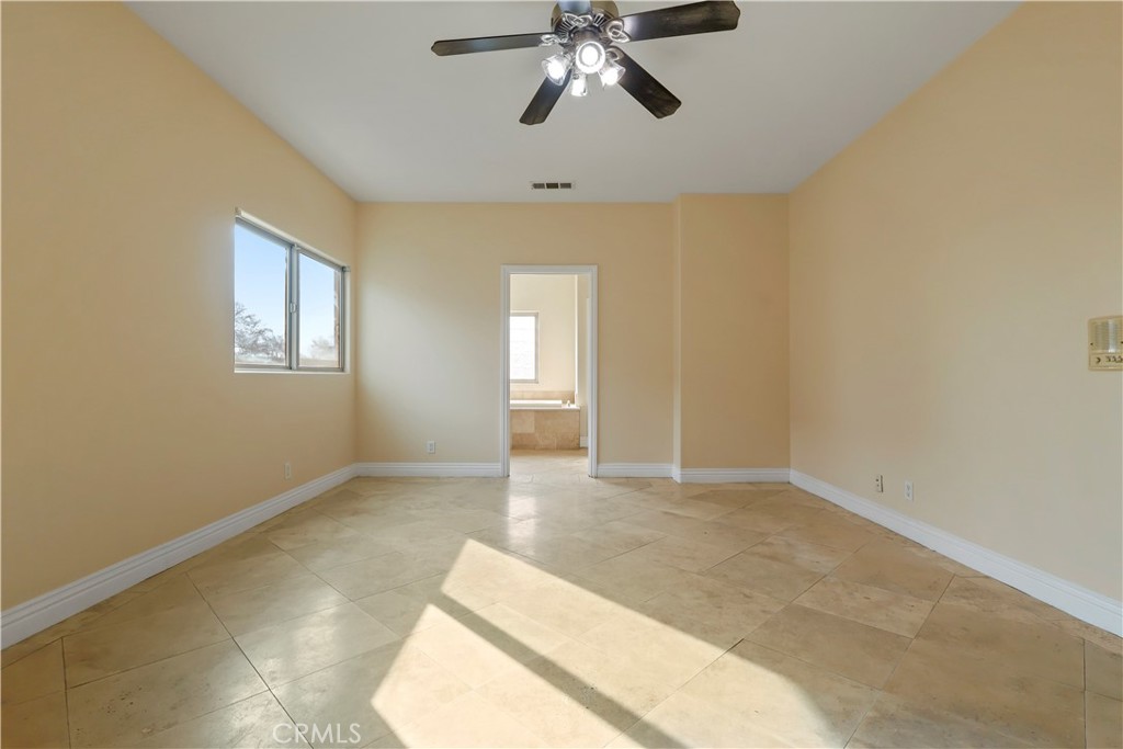 17100 Apple Street Bellflower, CA 90706 - Photo 30 of 38 a view of empty room with window