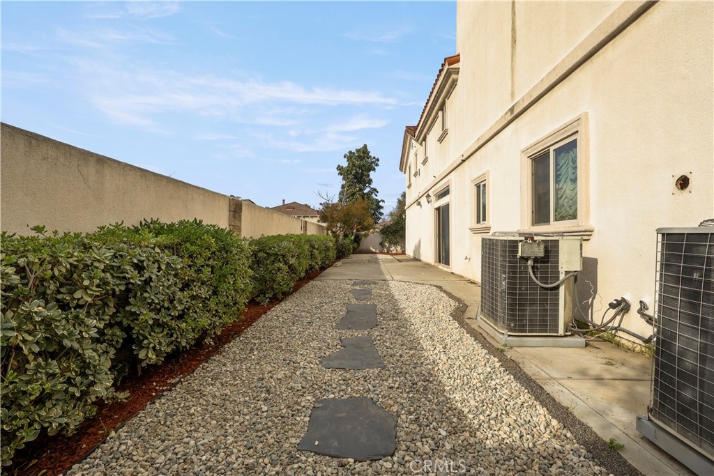 17100 Apple Street Bellflower, CA 90706 - Photo 5 of 38 a view of a back yard of the house