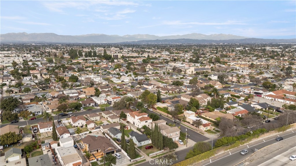 17100 Apple Street Bellflower, CA 90706 - Photo 7 of 38 an aerial view of residential building and street