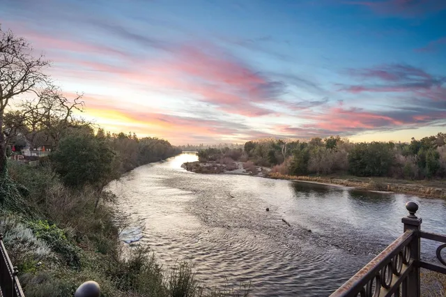 a view of a lake from a balcony