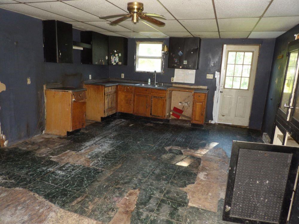 119 North Summit Road Greenville, PA 16125 - Photo 2 of 10 a kitchen with stainless steel appliances granite countertop a sink a stove counter space and cabinets