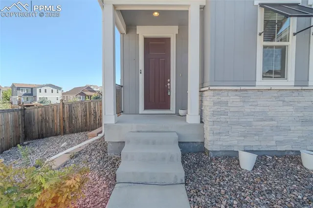 a view of a pathway door of the house
