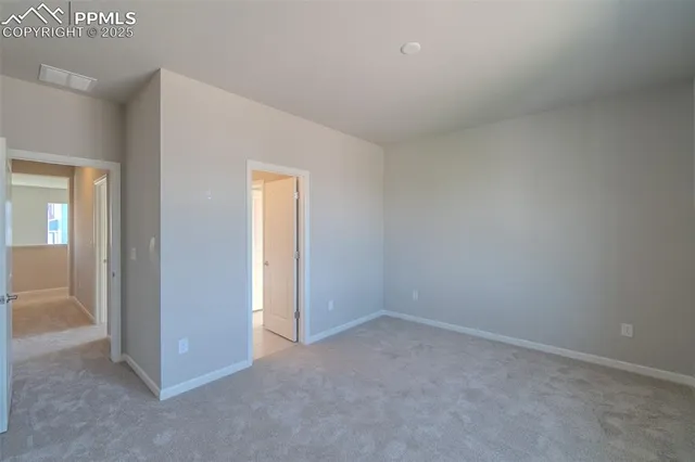 a bathroom with a toilet and a bathtub