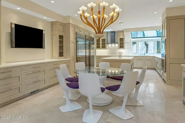 a kitchen with a sink stove and refrigerator