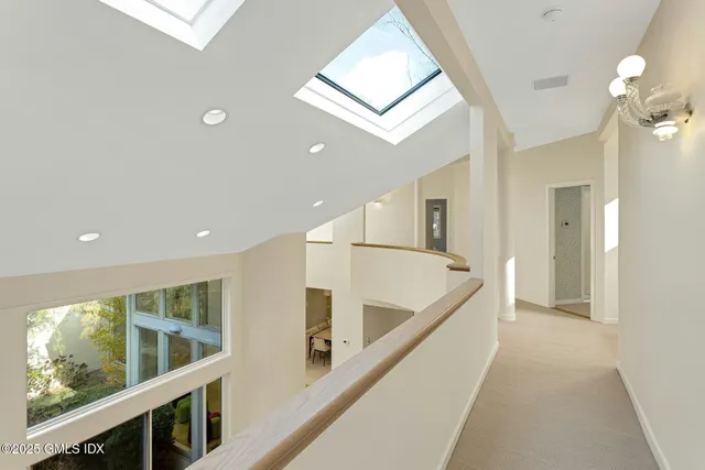 a bedroom with a large bed and a couch