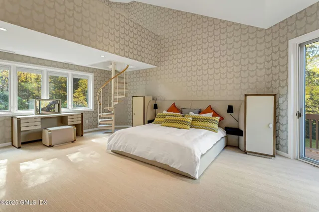a bathroom with a granite countertop sink mirror and bathtub