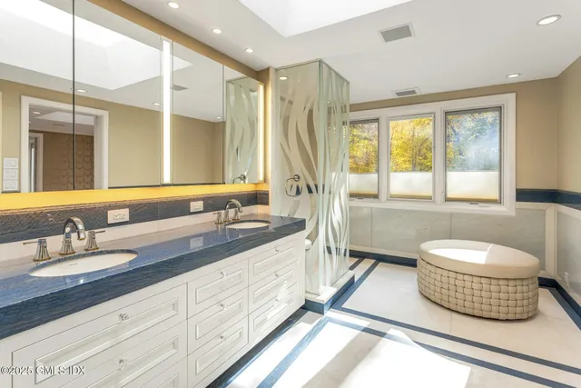 a bedroom with a bed and a table