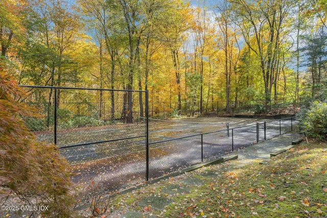 a aerial view of a house with a yard