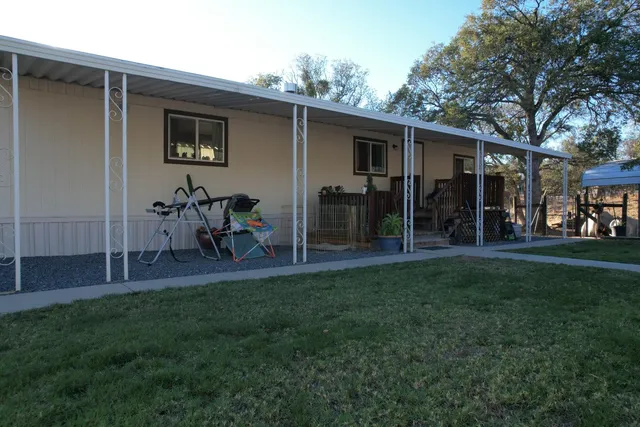 a view of a house with a deck
