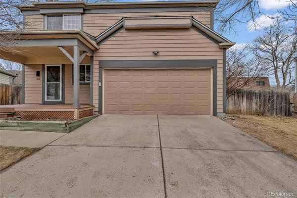 a view of a house with a parking space