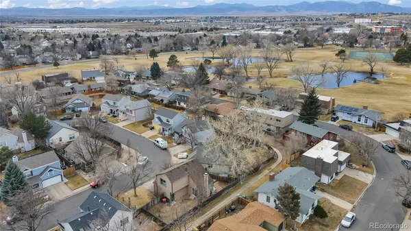 an aerial view of residential building with parking space