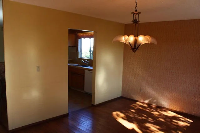 a view of a livingroom with a wooden floor