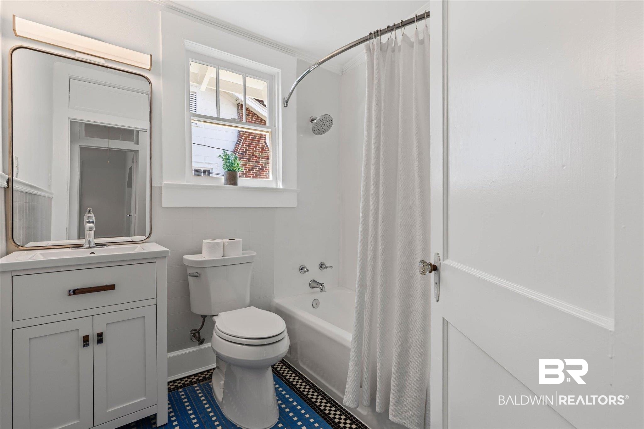 2153 Old Government Street Mobile, AL 36606 - Photo 17 of 23 Bathroom featuring shower / tub combo with curtain, vanity, and crown molding