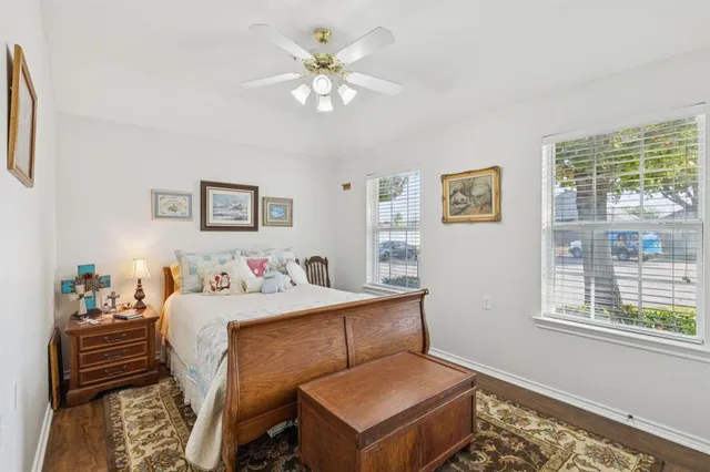 a bedroom with a bed and a table