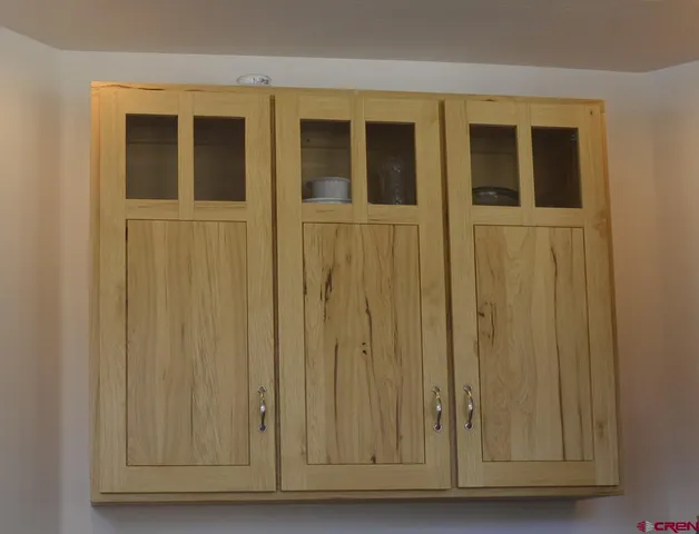 a balcony with furniture and window