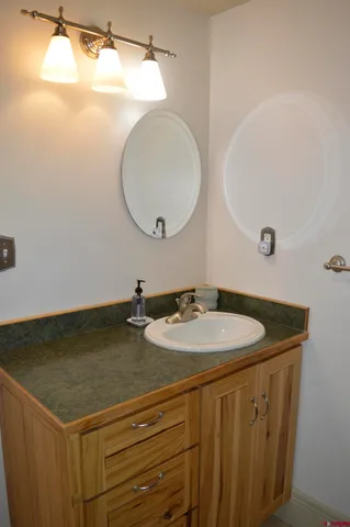 a view of room with a window and a potted plant