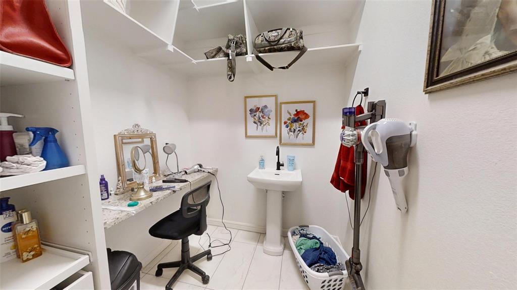 9503 Bellechase Road Granbury, TX 76049 - Photo 19 of 37 Dressing/Makeup vanity Primary Walk-in