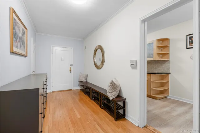 a room with furniture and a window