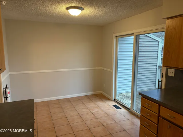 $365,000 | 661 Ellicott Avenue, Unit 103, Toms River, NJ 08753