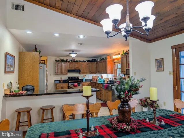 a room with furniture and a book shelf