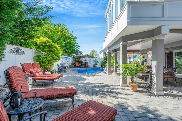 a outdoor space with furniture and wooden floor