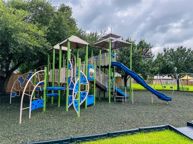 a view of a park with slide