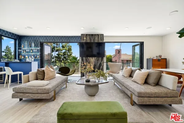 a living room with furniture and a couch