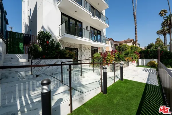 a view of a yard front of house