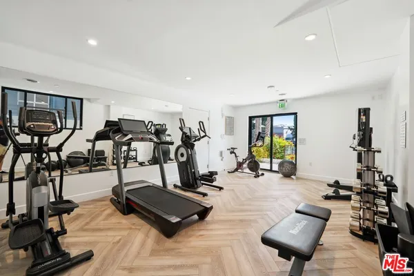 a view of a room with gym equipment