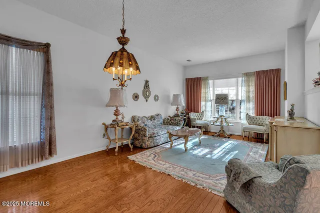 a very nice looking room with bed and a window